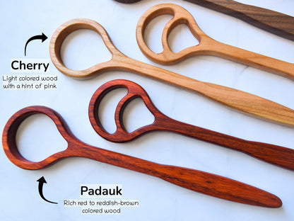Showing the dough whisk in cherry wood and padauk wood